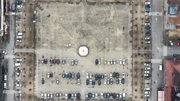 Aerial view of a square with cars parked France.