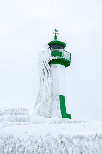 View of Molenfeuer Sassnitz covered in thick ice during a freezing winter day in Sassnitz Mecklenburg Vorpommern Germany.