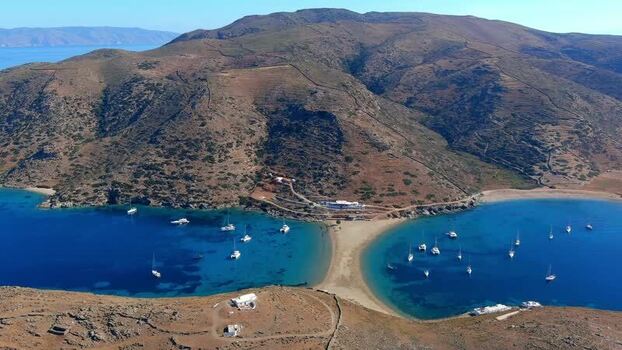 Aerial view of double sided beach and boats in Islands Greece. Aerial view of double sided beach and boats in Islands Greece.
