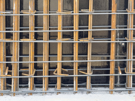 View of steel reinforcement bars and rebar mesh installed for concrete foundation at a construction site Sariyer Istanbul Turkiye. View of steel reinforcement bars and rebar mesh installed for concrete foundation at a construction site Sariyer Istanbul Turkiye.