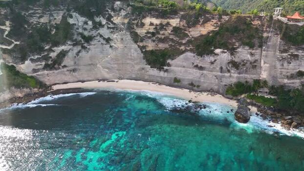 Aerial view of Diamond Beach and limestone cliffs in Indonesia. Aerial view of Diamond Beach and limestone cliffs in Indonesia.