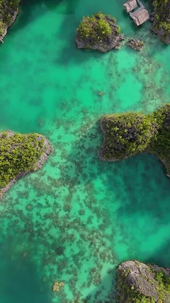 Aerial view of Piaynemo karst islands in Indonesia. Aerial view of Piaynemo karst islands in Indonesia.
