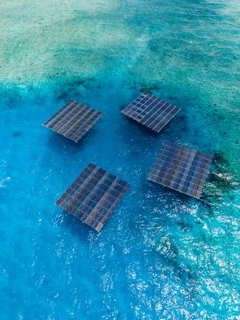 Aerial view of SolarSea floating solar power plant by Swimsol on turquoise ocean water Dharavandhoo Baa Atoll Maldives. Aerial view of SolarSea floating solar power plant by Swimsol on turquoise ocean water Dharavandhoo Baa Atoll Maldives.
