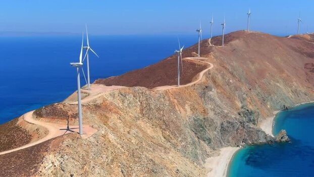 Aerial view of wind turbines on a ridge in Greece. Aerial view of wind turbines on a ridge in Greece.
