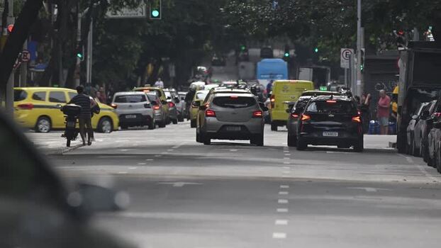 View of heavy traffic on a busy street in Copacabana Brazil.
