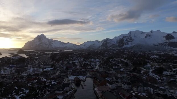 Aerial view of Lofoten mountains and harbor in Norway.