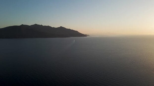 Aerial View of the coastline at sunset Elba Island Tuscany Italy.