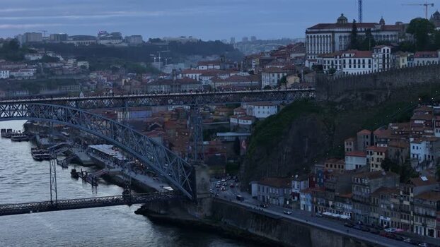 Aerial view of Dom Luis I bridge and buildings in ribeira historical center Porto Portugal. Aerial view of Dom Luis I bridge and buildings in ribeira historical center Porto Portugal.