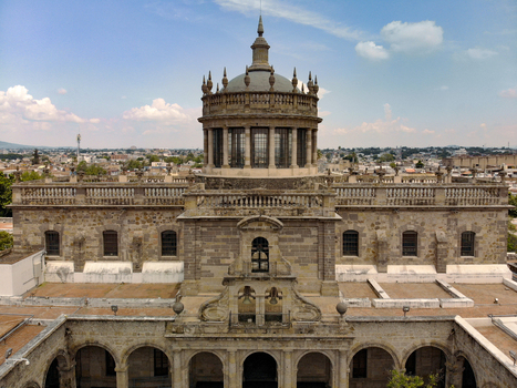 Aerial view of the historic Hospicio Cabanas with its iconic dome stone architecture and surrounding urban landscape in Guadalajara Jalisco Mexico. Aerial view of the historic Hospicio Cabanas with its iconic dome stone architecture and surrounding urban landscape in Guadalajara Jalisco Mexico.