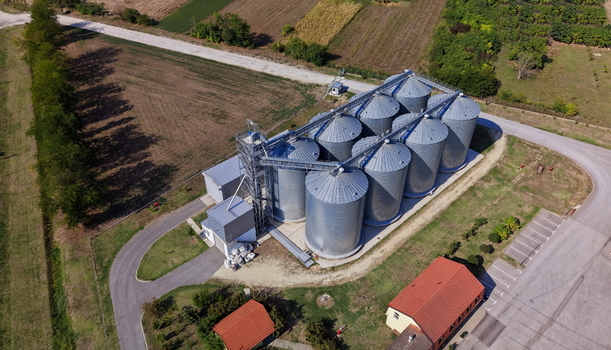 Aerial view of the grain silos in Bavaniste surrounded by agricultural fields and rural landscape in Bavaniste Vojvodina Serbia.