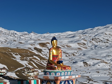 Kaza India 28 January 2026 View of the golden Buddha statue in Spiti Valley overlooking snow covered Himalayan mountains under a clear blue sky. Kaza India 28 January 2026 View of the golden Buddha statue in Spiti Valley overlooking snow covered Himalayan mountains under a clear blue sky.