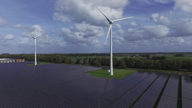Aerial view of wind turbines and solar panels Netherlands.