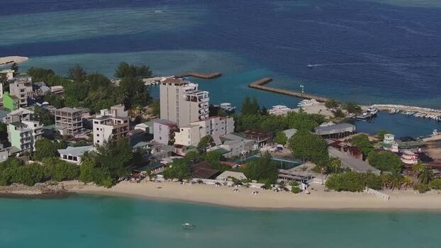 Aerial view of Gulhi island and harbor Maldives. Aerial view of Gulhi island and harbor Maldives.