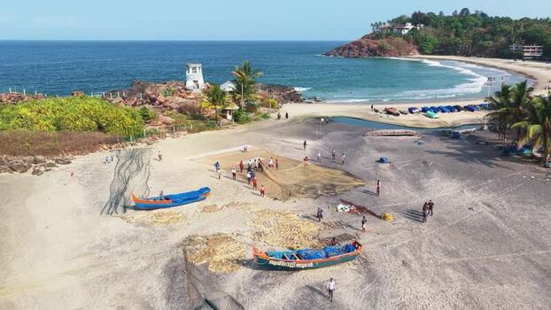 Aerial view of fishermen with nets on the beach India. Aerial view of fishermen with nets on the beach India.