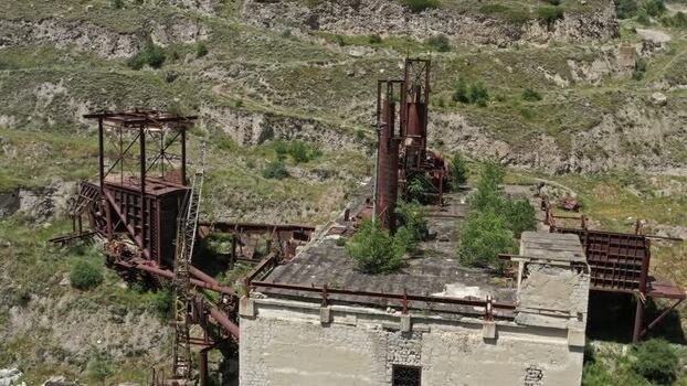 Aerial view of abandoned factory in Caucasus Mountains Russia.