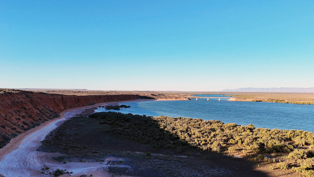 Aerial view of Matthew Flinders Red Cliff Lookout with red cliffs coastal vegetation and calm blue waters of the Spencer Gulf in Port Augusta West South Australia Australia. Aerial view of Matthew Flinders Red Cliff Lookout with red cliffs coastal vegetation and calm blue waters of the Spencer Gulf in Port Augusta West South Australia Australia.