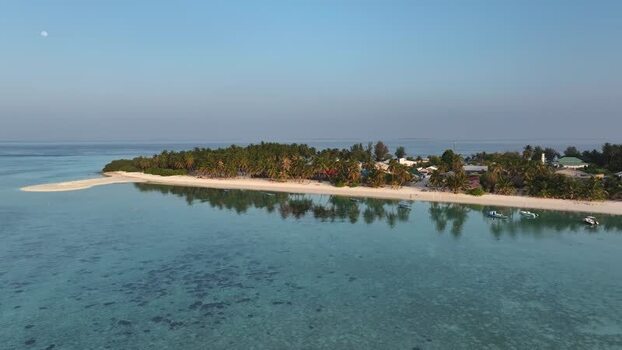 Aerial view of a tropical island with palm trees Maldives. Aerial view of a tropical island with palm trees Maldives.