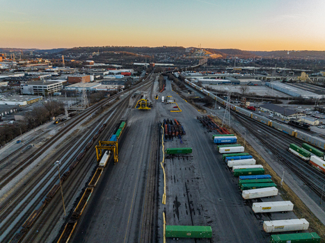 Cincinnati United States 27 February 2026 Aerial view of a vast railyard bathed in the warm glow of the setting sun the steel tracks gleaming against the dark asphalt. Cincinnati United States 27 February 2026 Aerial view of a vast railyard bathed in the warm glow of the setting sun the steel tracks gleaming against the dark asphalt.