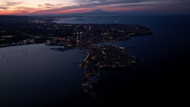 Aerial view of the Island of Ortigia at night Italy. Aerial view of the Island of Ortigia at night Italy.