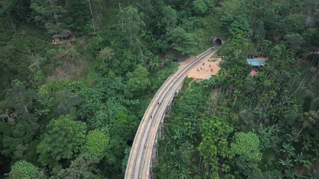Aerial view of Nine Arches Bridge in lush jungle Sri Lanka.