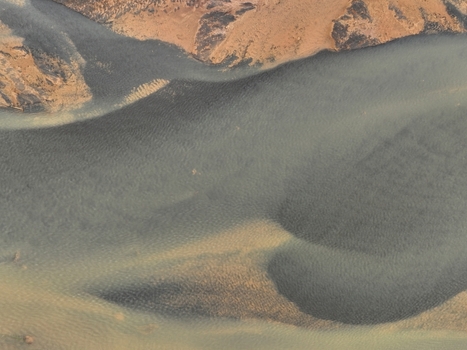 Aerial view of the river Olfusa flowing through the landscape in Selfoss Sveitarfelagid Arborg Iceland. Aerial view of the river Olfusa flowing through the landscape in Selfoss Sveitarfelagid Arborg Iceland.