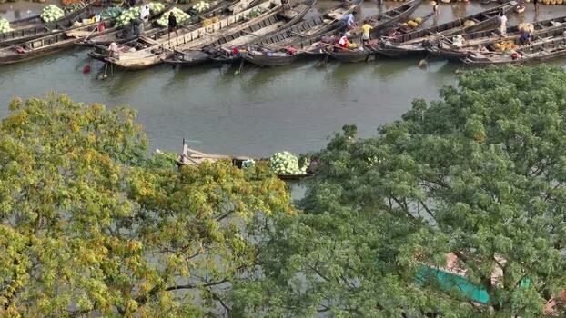 Aerial view of wooden boats loaded with watermelons Bangladesh.