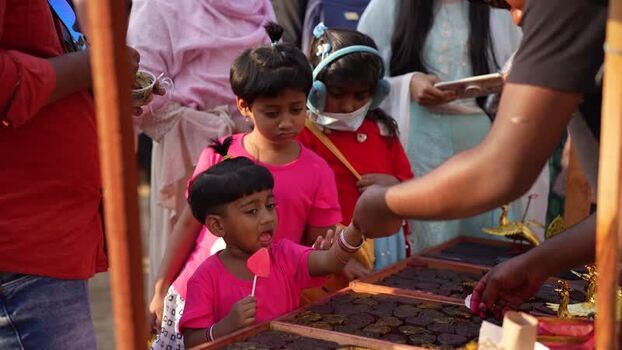 View of children at a street stall in Faridpur Bangladesh. View of children at a street stall in Faridpur Bangladesh.