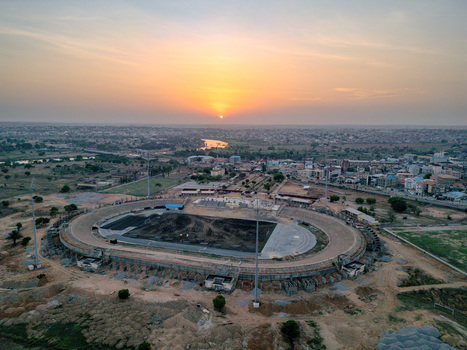 Kaduna Nigeria 02 May 2026 Aerial view of Ahmadu Bello Stadium showing the running track and field under renovation against the backdrop of the city skyline at sunset. Kaduna Nigeria 02 May 2026 Aerial view of Ahmadu Bello Stadium showing the running track and field under renovation against the backdrop of the city skyline at sunset.
