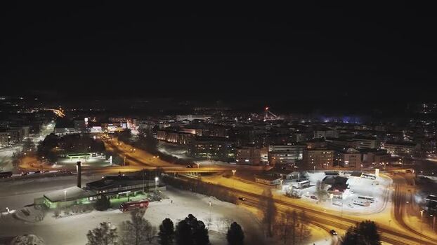 Aerial view of Rovaniemi city lights at night in winter Finland. Aerial view of Rovaniemi city lights at night in winter Finland.
