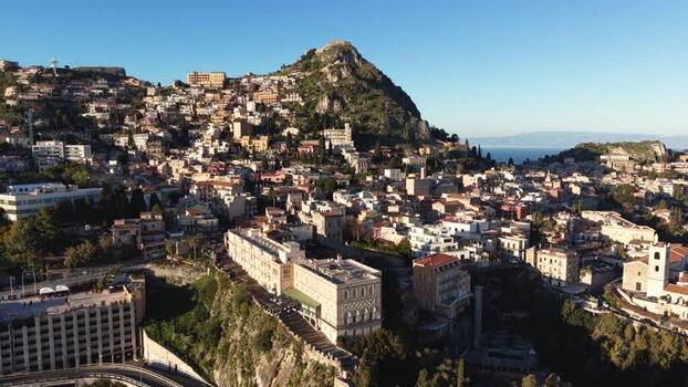 Aerial view of the historic hillside town of Taormina Italy.