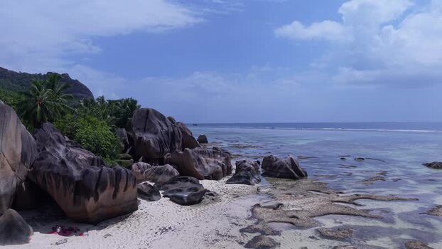 Aerial view of Anse Reunion beach and granite boulders Seychelles.