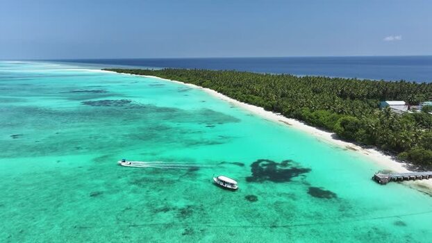 Aerial view of boats near Fulhadhoo island beach Maldives. Aerial view of boats near Fulhadhoo island beach Maldives.