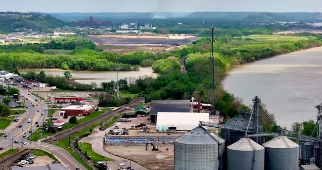Aerial view of industrial silos and the Ohio River United States. Aerial view of industrial silos and the Ohio River United States.