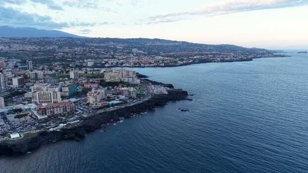 Aerial view of the coastline and city of Catania Italy. Aerial view of the coastline and city of Catania Italy.