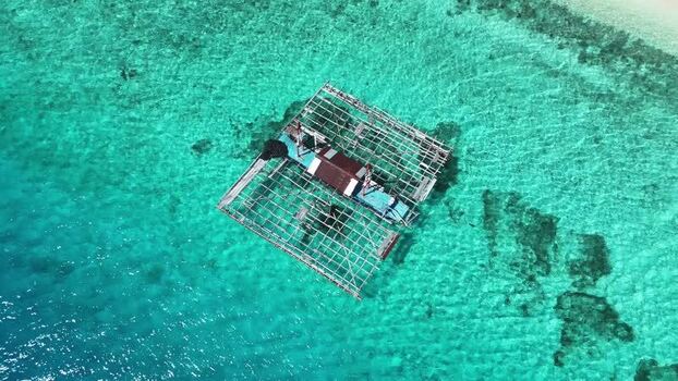 Aerial view of fishing platform at Pantai Yanain Hulaliu Indonesia. Aerial view of fishing platform at Pantai Yanain Hulaliu Indonesia.