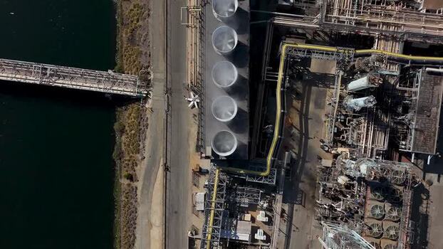 Aerial view of industrial cooling towers in Carson United States.