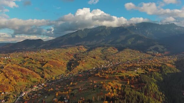 Aerial view of Transylvania mountains and autumn forests Romania.