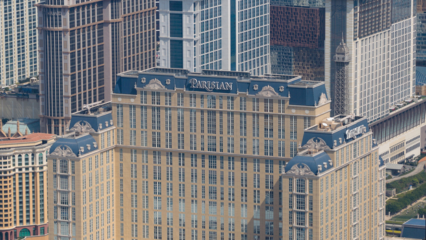 Macao 18 February 2026 Aerial view of The Parisian hotel featuring its distinctive French inspired architecture blue mansard roofs and surrounding luxury resort skyscrapers on the Cotai Strip. Macao 18 February 2026 Aerial view of The Parisian hotel featuring its distinctive French inspired architecture blue mansard roofs and surrounding luxury resort skyscrapers on the Cotai Strip.