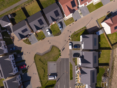 Linlithgow United Kingdom 29 April 2026 Aerial view of a modern residential housing estate with neat rows of houses parked cars and solar panels on rooftops. Linlithgow United Kingdom 29 April 2026 Aerial view of a modern residential housing estate with neat rows of houses parked cars and solar panels on rooftops.