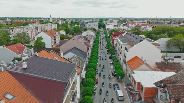 Aerial view of motorcycles on a street in Sremska Mitrovica Serbia. Aerial view of motorcycles on a street in Sremska Mitrovica Serbia.