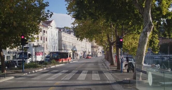 View of a street in Rijeka with traffic and historic buildings Croatia. View of a street in Rijeka with traffic and historic buildings Croatia.