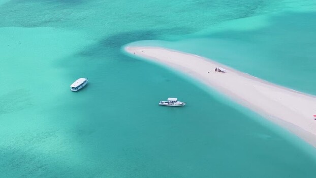 Aerial view of a white sandbank and boats in turquoise water Maldives. Aerial view of a white sandbank and boats in turquoise water Maldives.