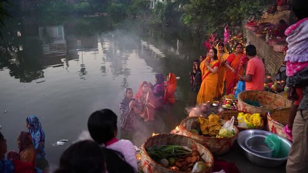 View of Hindu devotees performing rituals by a river Bangladesh. View of Hindu devotees performing rituals by a river Bangladesh.