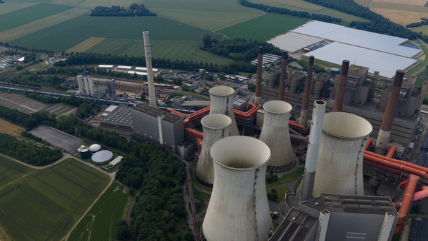 Aerial view of Kraftwerk Niederaussem a large coal fired power plant with cooling towers and industrial infrastructure in Bergheim Nordrhein Westfalen Germany. Aerial view of Kraftwerk Niederaussem a large coal fired power plant with cooling towers and industrial infrastructure in Bergheim Nordrhein Westfalen Germany.