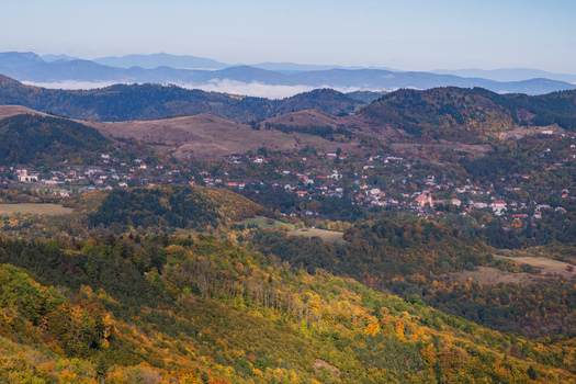 Aerial view of the forested hills and autumn landscape surrounding the village of Ilija near Sitno mountain in Ilija Banska Bystrica Regio Slovakia. Aerial view of the forested hills and autumn landscape surrounding the village of Ilija near Sitno mountain in Ilija Banska Bystrica Regio Slovakia.