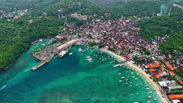 Aerial view of coastal harbor and town in Bali Indonesia.