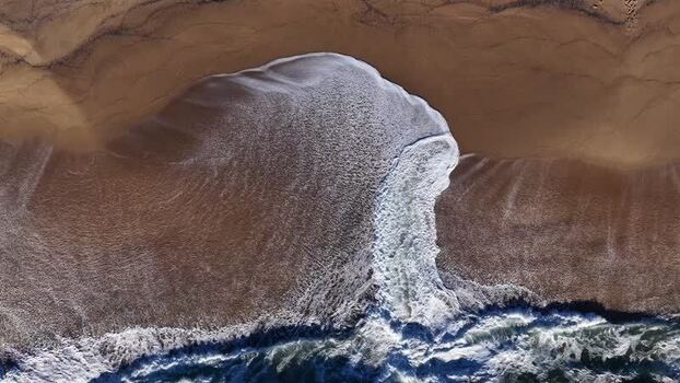 Aerial view of beach and waves Portugal.