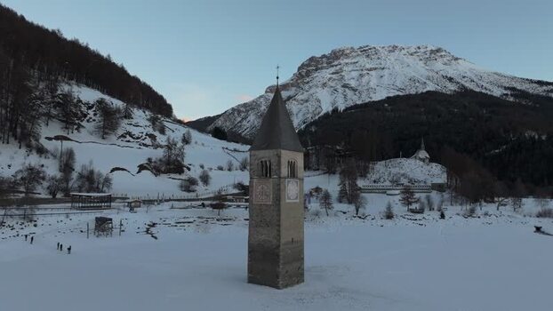 Aerial view of the submerged bell tower in Graun im Vinschgau Italy. Aerial view of the submerged bell tower in Graun im Vinschgau Italy.