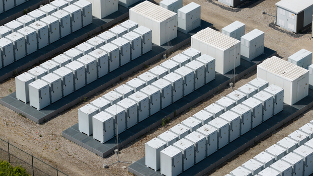 Wanneperveen Netherlands 23 May 2026 Aerial view of rows of white industrial battery storage units and electrical containers at a renewable energy facility under bright daylight. Wanneperveen Netherlands 23 May 2026 Aerial view of rows of white industrial battery storage units and electrical containers at a renewable energy facility under bright daylight.