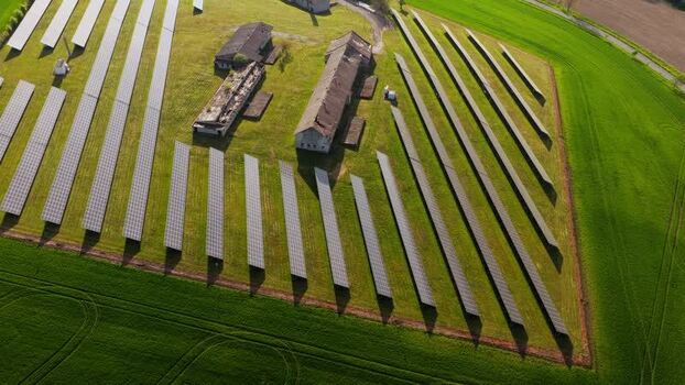 Aerial view of solar panels and farm buildings Czechia. Aerial view of solar panels and farm buildings Czechia.